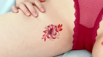 Creative Expression through Temporary Red Flower Tattoos #1