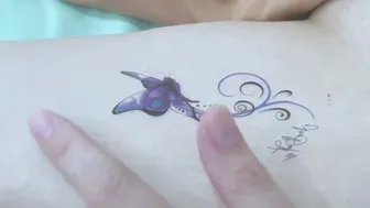 Temporary Ink Magic: Purple Butterfly Tattoo Showcase