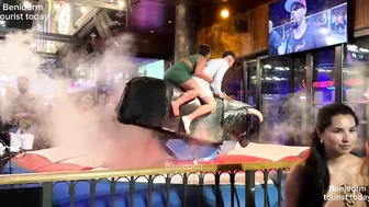 Boy and girl bull riding together in Benidorm Spain ♥️♥️♥️♥️! Mechanical bull riding ! Benidorm bull #2