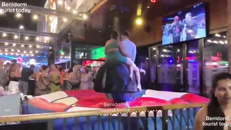 Boy and girl bull riding together in Benidorm Spain ♥️♥️♥️♥️! Mechanical bull riding ! Benidorm bull #3