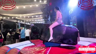 Girl in short dresses on Benidorm bull tonight! Mechanical bull riding 8k #2